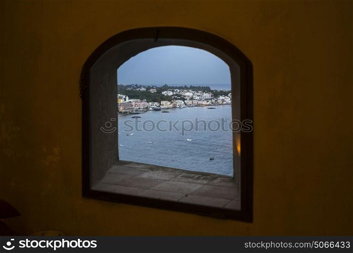 View of city seen through window, Aragonese Castle, Ischia Island, Campania, Italy