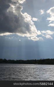 View of clouds over a lake, Lake of the Woods, Ontario, Canada