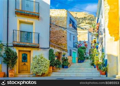 View of colorful houses and narrow streets in the old Mediterranean town of Alicante, Spain  vibrant illustration