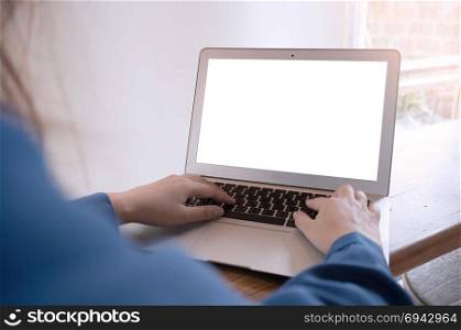 View of Details of business man hands typing on keyboard with blank screen.
