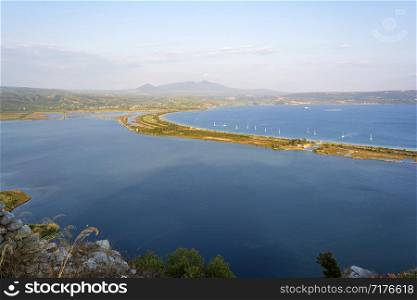 View of Divari Beach and the Divari lagoon in the Peloponnese region of Greece, from the Palaiokastro (old Navarino Castle).. View of Divari Beach and the Divari lagoon in the Peloponnese region of Greece, from the Palaiokastro