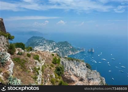 view of Faraglioni cliffs and Tyrrhenian Sea on Capri Island, Italy