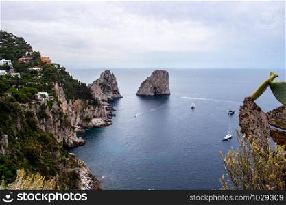 view of Faraglioni rocks visible in Capri, Italy. Faraglioni rocks visible in Capri, Italy