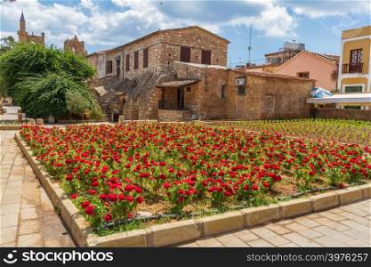 View of Flowers in a square in the walled old medieval city of Famagusta, island of Cyprus