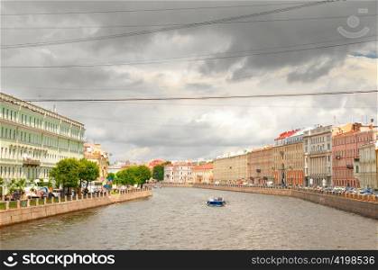 view of Fontanka canal with dramatic skies, Saint-Petersburg, Russia