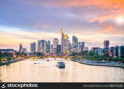 View of Frankfurt city skyline in Germany with sunset light