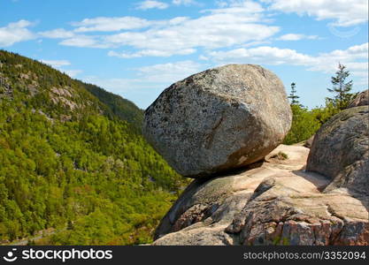 View of giant boulder in Acadia National Park, Atlantic Coast of Maine.