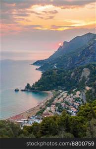 View of Glifada village on Corfu coast at sunset, Greece
