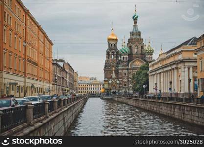 View of Griboedovs channel about the Resurrection Temple in the city of St. Petersburg.