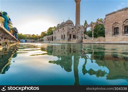 View of Halil-Ur Rahman Lake or named Balikli Gol(fish lake) in Sanliurfa,Turkey.. View of Nebi Prophet Mosque built by Akkoyunlus