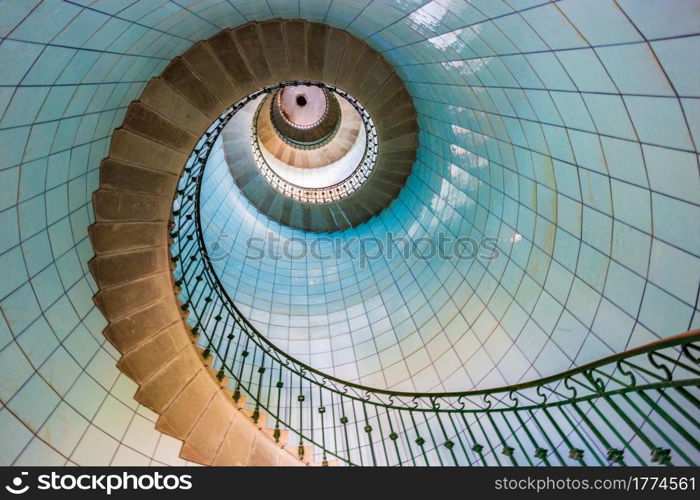 View of high lighthouse blue staircase, vierge island, brittany,france. High lighthouse stairs, vierge island, brittany,france