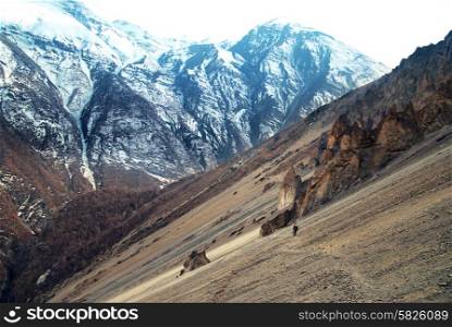 View of Himalayas mountains from Annapurna trek. Man standing on the path