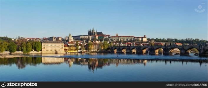 View of historic center of Prague Charles bridge over Vltava river and Gradchany Prague Castle and St. Vitus Cathedral in the morning