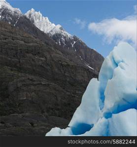 View of iceberg with mountain, Grey Glacier, Grey Lake, Torres del Paine National Park, Patagonia, Chile