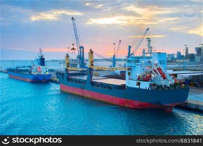View of industrial port at sunrise. Brindisi, Italy