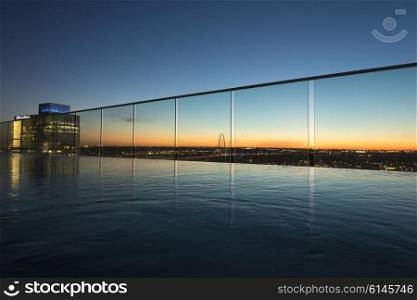 View of infinity pool at dusk, Victory Park, Dallas, Texas, USA
