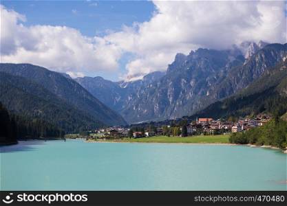 view of italian town Auronzo di Cadore on a lake Santa Caterina
