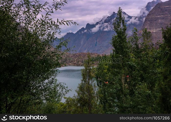 view of Kachura lake with mountain and foliage, Skardu, Gilgit Baltistan, Pakistan.