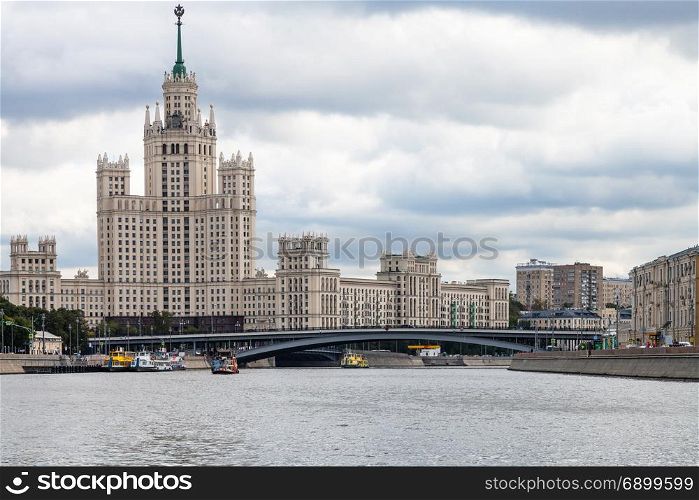 view of Kotelnicheskaya Embankment High-Rise Building and Bolshoy Ustinsky Bridge of Moskva River in Moscow city in autumn