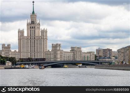view of Kotelnicheskaya Embankment High-Rise Building and Bolshoy Ustinsky Bridge of Moskva River in Moscow city in autumn