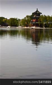 View of lake and ancient tower in Beijing, close to Forbidden City