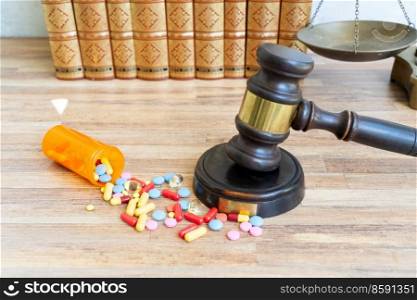 view of law gavel, stethoscope and pills, medical law concept. medical law concept