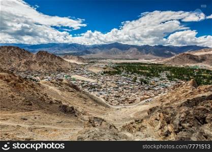 View of Leh city in Indus valley from above in Himalayas. Ladakh, Jammu and Kashmir, India. View of Leh from above. Ladakh, Jammu and Kashmir, India