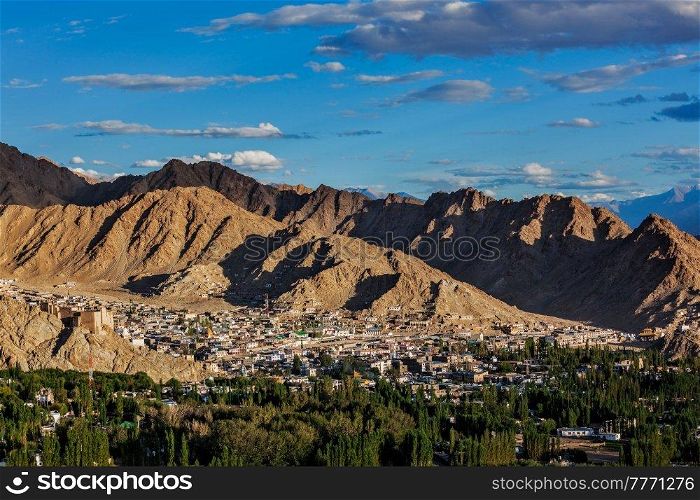 View of Leh from above from Shanti Stupa on sunset in Himalayas. Ladakh, Jammu and Kashmir, India. View of Leh, India