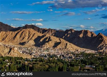 View of Leh from above from Shanti Stupa on sunset in Himalayas. Ladakh, Jammu and Kashmir, India. View of Leh, India