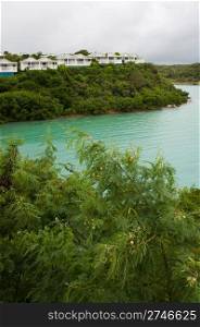 view of Long Bay with resort villas and seascape in Antigua (overcast weather)