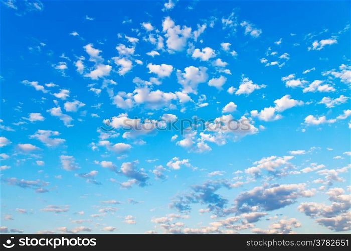 view of many little white clouds in summer blue sky