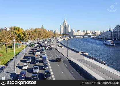 View of Moskvoretskaya embankment and Moscow river. Stalin&rsquo;s high-rise building in the distance. Moscow, Russia.