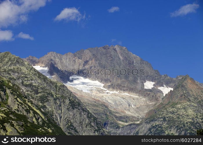 View of mountain peaks in spring time in Switzerland