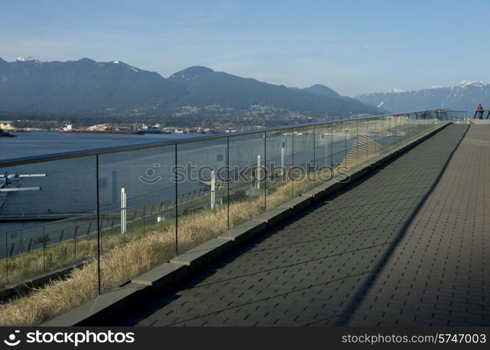 View of North Vancouver with mountains in the background, Coal Harbour, Vancouver, British Columbia, Canada