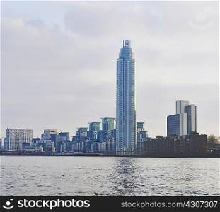View of office and apartment blocks on the Thames, London, UK