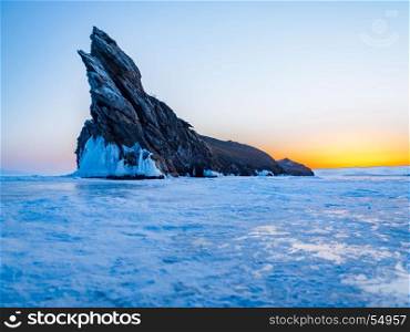 View of Ogoy Island in Frozen Lake Baikal, Russia, at dawn