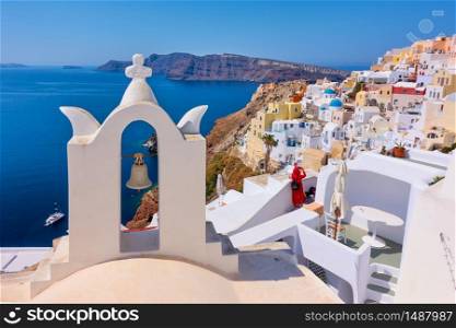 View of Oia town in Santorini island with old bell tower, Greece -- Greek landscape
