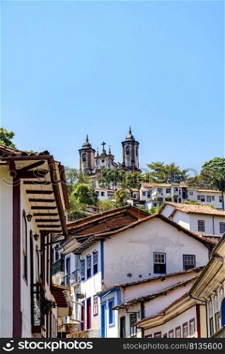 View of old houses and churches in colonial architecture from the 18th century in the historic city of Ouro Preto in Minas Gerais, Brazil. View of old houses and church in colonial architecture from the 18th century