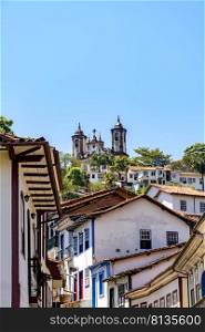 View of old houses and churches in colonial architecture from the 18th century in the historic city of Ouro Preto in Minas Gerais, Brazil. View of old houses and church in colonial architecture from the 18th century