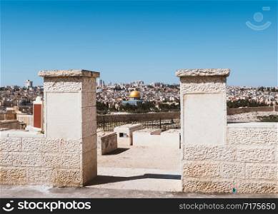 View of Old Jerusalem and framed Dome of the Rock on the Temple Mount from the Mount of Olives, Israel - with copy space. Old Jerusalem Panorama from Mount of Olives