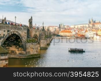 View of old Prague and St. Vitus Cathedral. Red tiled roofs and towers of the old town.. Prague. View of the old city.