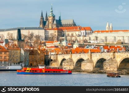 View of old Prague and St. Vitus Cathedral. Red tiled roofs and towers of the old town.. Prague. View of the old city.