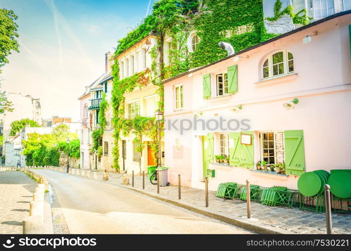 View of old street in quarter Montmartre in Paris, France. Cozy cityscape of Paris at summer. Architecture and landmarks of Paris, retro toned. cityscape Mont Matre , Paris, France