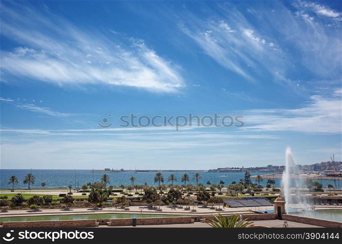 View of Palma de Mallorca with sea on horizon in sunny summer day. View of Palma de Mallorca with sea on horizon
