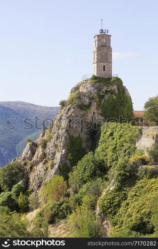 View of picturesque Arachova mountainous village with iconic tower clock in Greece, at the foot of Mount Parnassos, near Delphi.