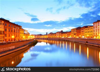 View of Pisa and Arno river at sundown, Italy