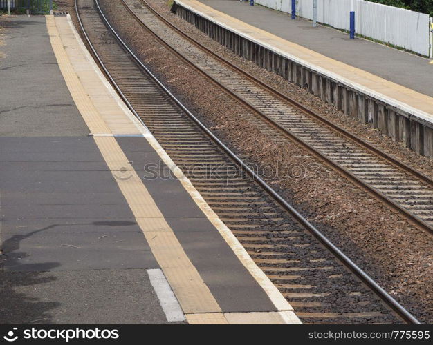 view of railroad railway station rails and platforms. railway station platform