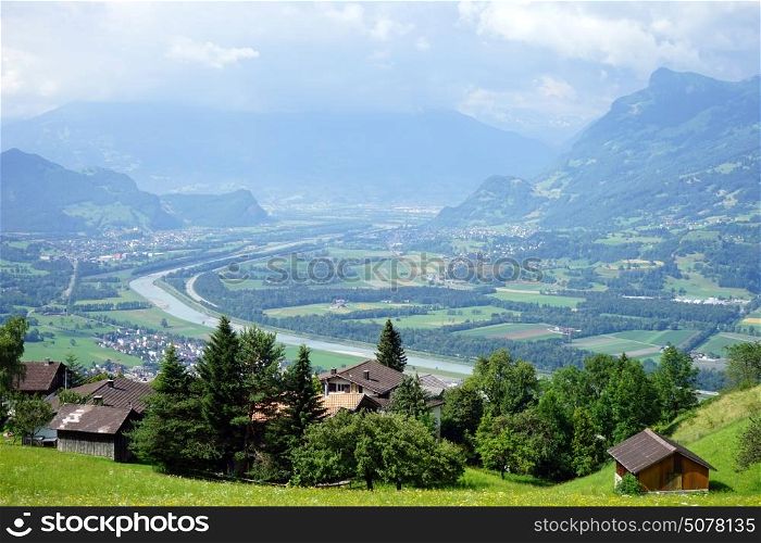 View of Rein valley and farm houses in Lichtenstein