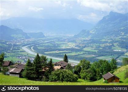 View of Rein valley and farm houses in Lichtenstein