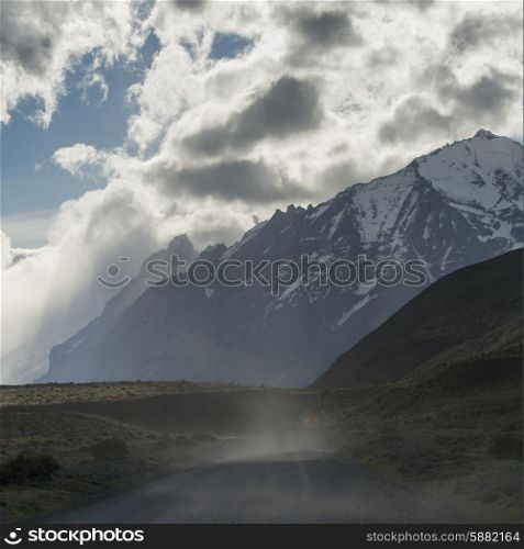 View of road with mountains, Torres del Paine National Park, Patagonia, Chile
